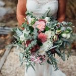 Garden style wedding bouquet of salmon tones - designed by Kim Chan Events
