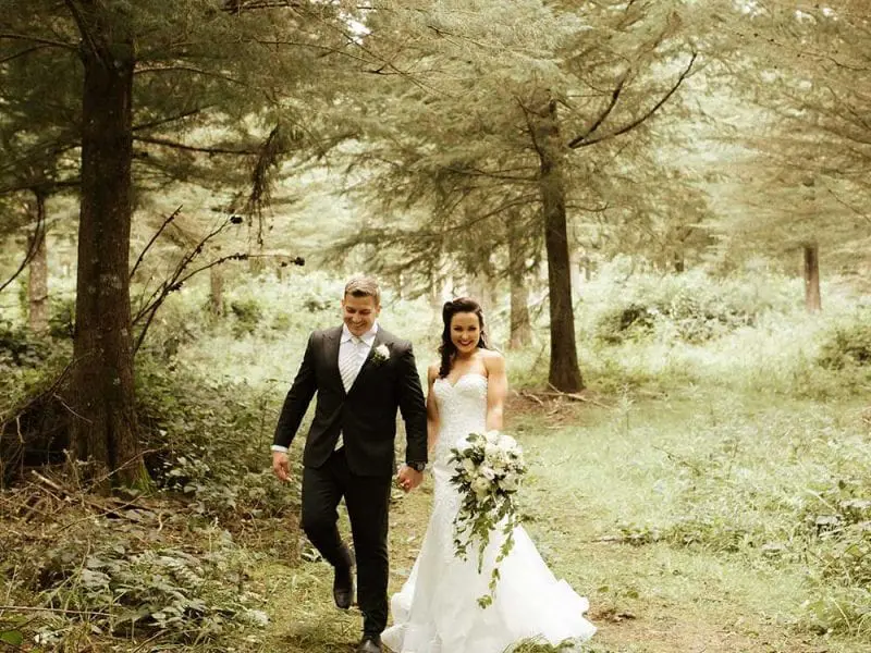 Bride and groom in the woods for their photos